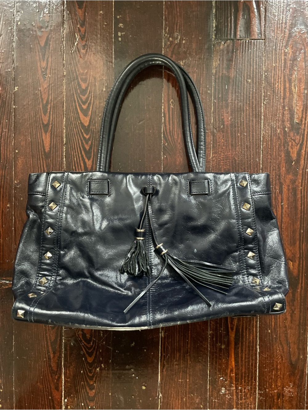 Toto Stud-Accent Black Leather Tote with Tassel Detail